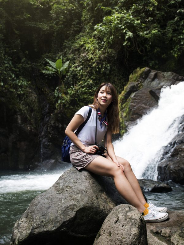 Asian woman enjoying an outdoor trip